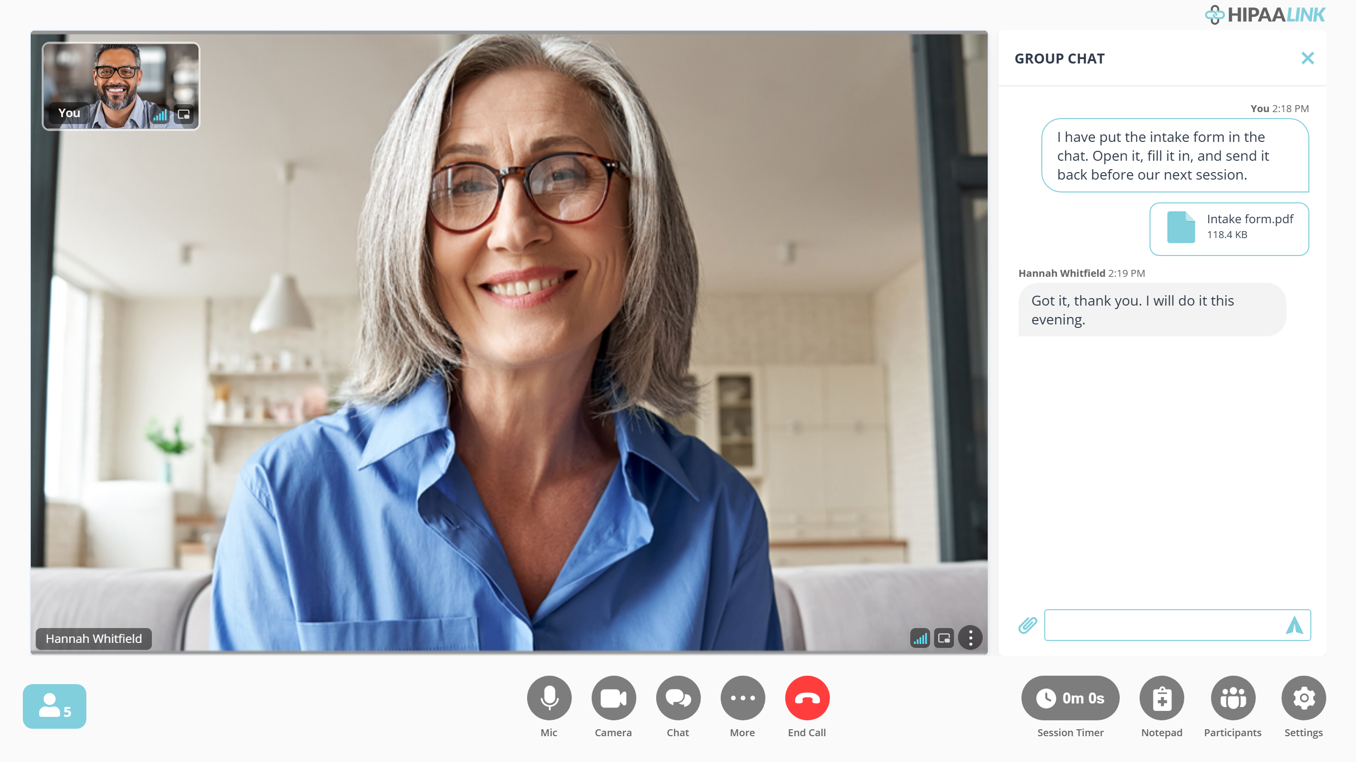 A call with the chat panel open down the right hand side, headed GROUP CHAT. Two messages are aligned to the right under the heading You: a paragraph about an intake form, and a file tile reading Intake form.pdf, 118.4 KB. Below them, aligned left under the heading Hannah Whitfield, is a short reply. A box for typing sits at the bottom with a paperclip beside it.